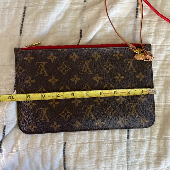 Authentic Louis Vuitton wristlet that comes in the never full. - Picture 5 of 6